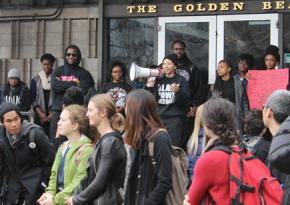 Members of the UC Berkeley Black Student Union outside the cafeteria occupation, with supporters in front