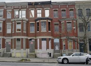 Boarded-up row houses in Baltimore