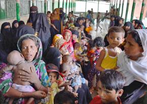 Rohingya refugees wait for medical care in Bangladesh