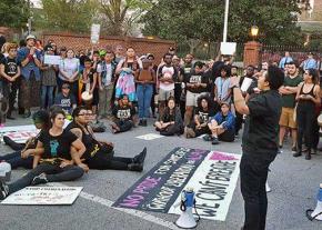 Protesters challenge an anti-LGBT law outside the North Carolina governor's mansion