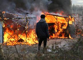 The refugee camp in Calais goes up in flames