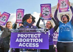 Representatives of the National Network of Abortion Funds rally outside the U.S. Supreme Court