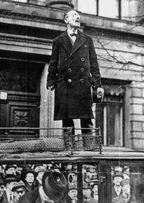 Germany revolutionary Karl Liebknecht speaks to a crowd from on top of a car
