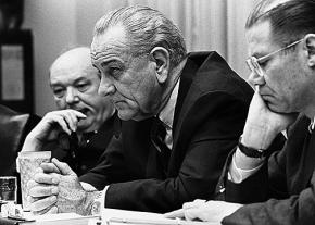 President Lyndon Johnson (center) with Defense Secretary Robert McNamara (right)