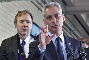 Chicago Mayor Rahm Emanuel speaks to the press flanked by CPS CEO Forrest Claypool