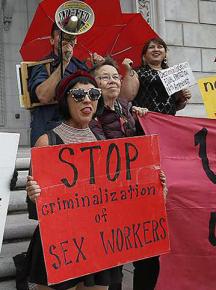 Protesters demand an end to the criminalization of sex work