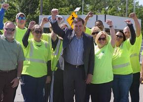 Rank-and-file Teamsters stand with reform presidential candidate Fred Zuckerman (center)