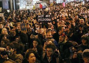Protesters pour into the streets of Manhattan to fight racism and bigotry after Trump's election