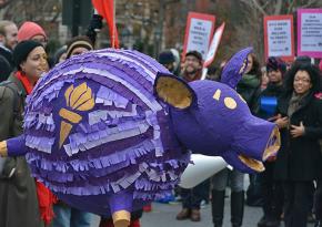 Graduate workers at New York University rally at a campus protest