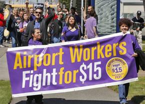 Workers at Seattle-Tacoma International Airport march for a living wage