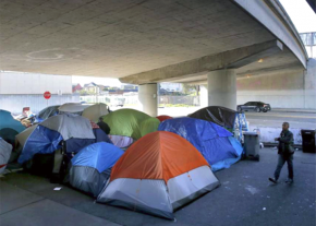 A homeless encampment underneath an interstate overpass in Oakland