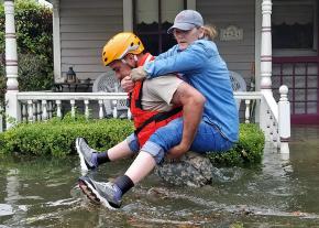 A Houston resident is rescued in the aftermath of Hurricane Harvey