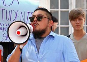 Immigrant rights activist Eric Nava-Perez speaks at a protest in Texas