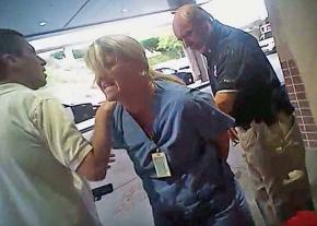 Nurse Alex Wubbels (center) is put under arrest in Salt Lake City