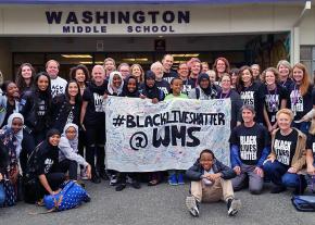 Students and teachers stand against racism at Washington Middle School in Seattle