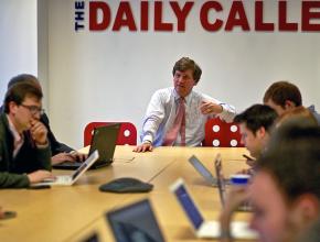 Fox News pundit Tucker Carlson leads an editorial meeting of the Daily Caller