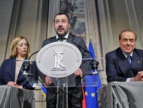 Northern League leader Matteo Salvini speaks, flanked by right-wing politician Giorgia Meloni and former Prime Minister Silvio Berlusconi