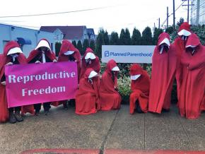 A “Handmaid's vigil” challenges the anti-choicers in Everett, Washington