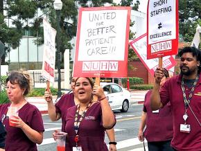 Members of the National Union of Healthcare Workers rally for safe staffing and better conditions